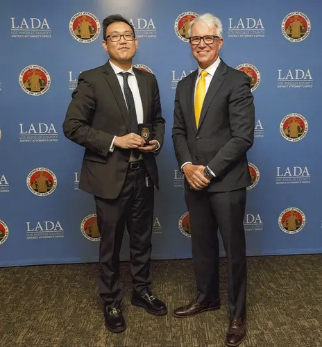 Attorney Andrew Jang with district attorney George Gascon